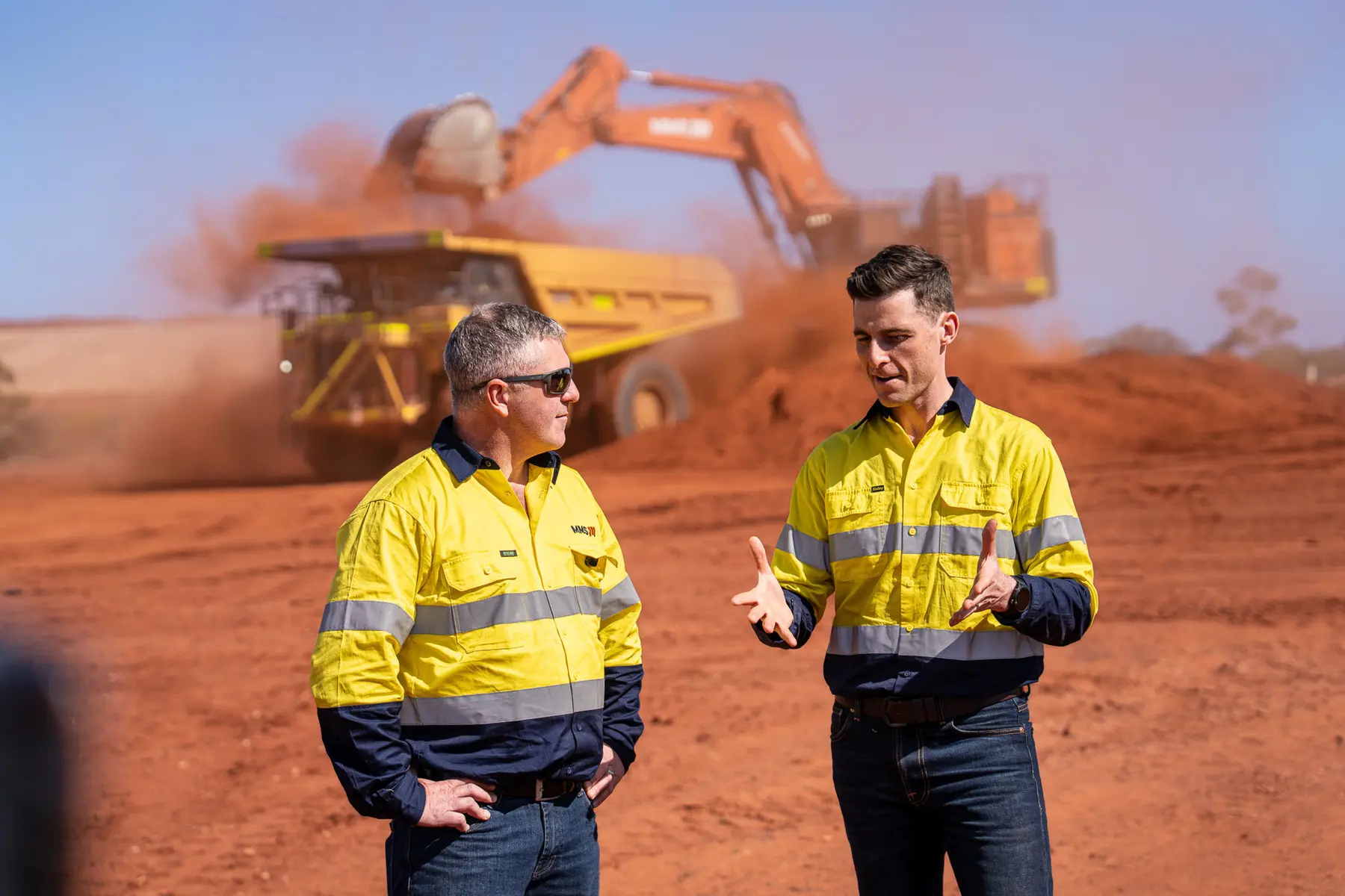 James Allan speaking with an MMS client at a mining operation