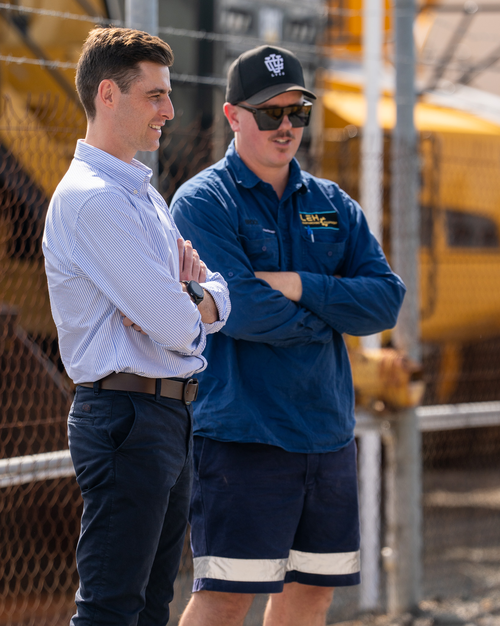James Allan speaking with Brock Harvey of LEH Equipment