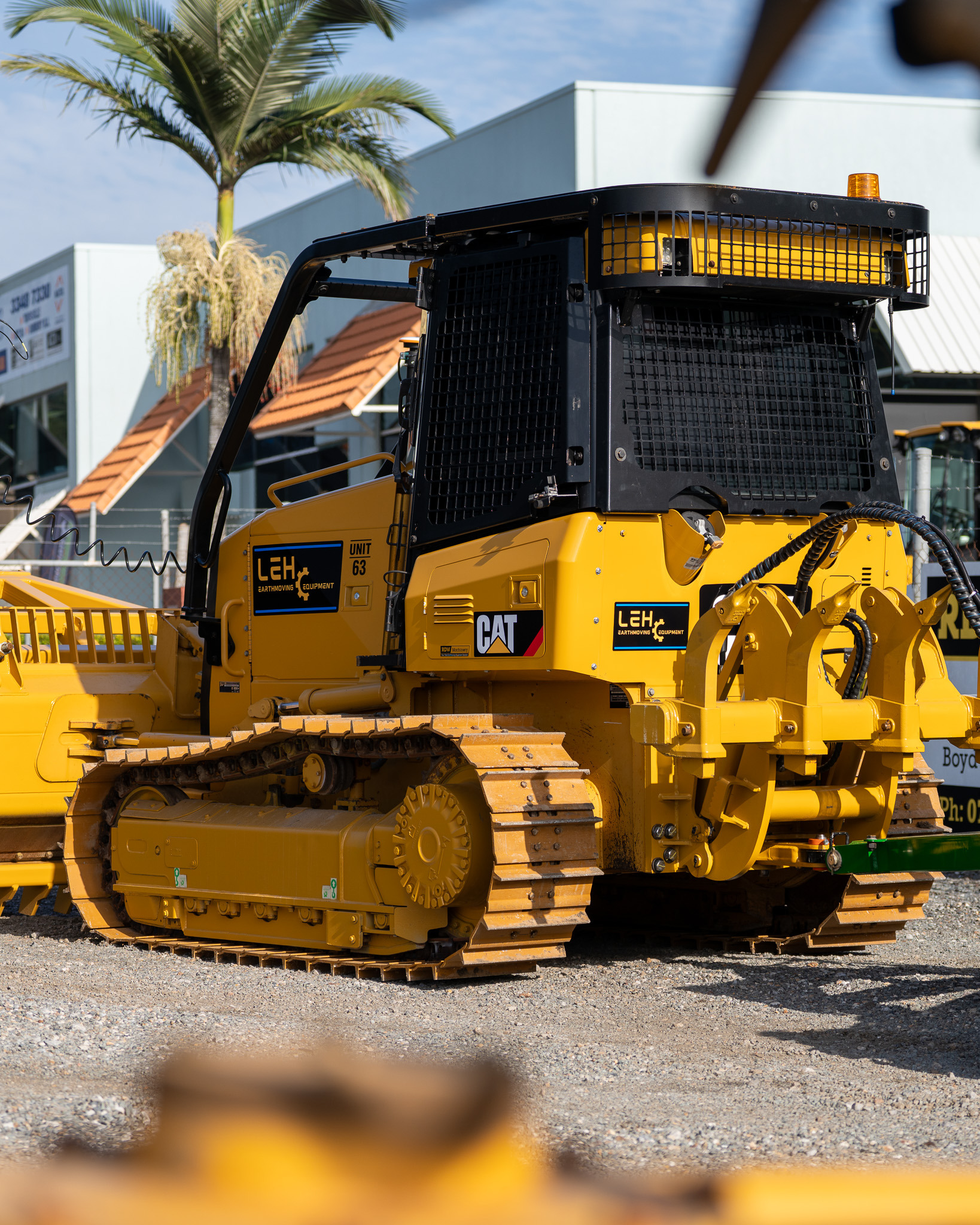 Close view of a LEH CAT bulldozer with protective guarding